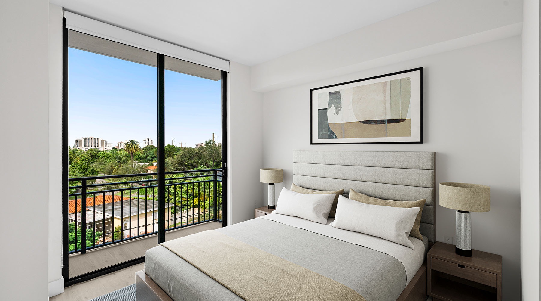 Relax and Unwind  bedroom with bed art and sliding window doors