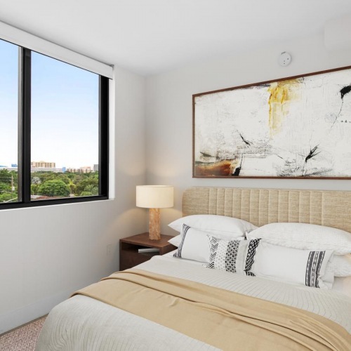 Relax and recharge in beautiful and spacious bedrooms a bedroom with a bed and large window