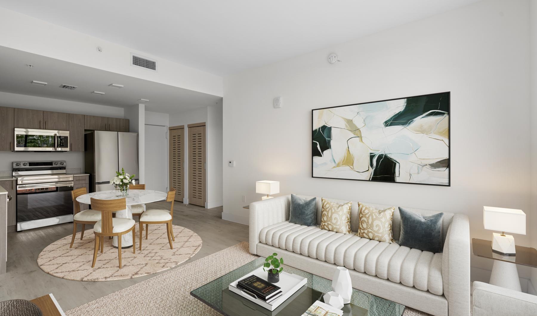 Wide open living areas perfect for entertaining a living room with a couch and a table